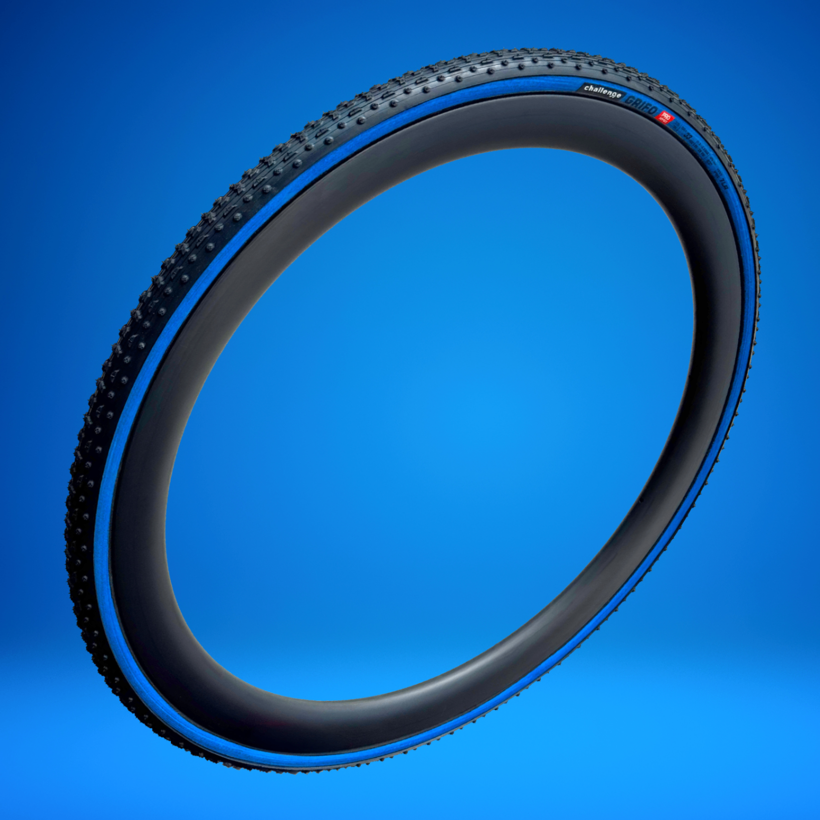 NJCX anniversary blue sidewall Grifo tire, full ring view